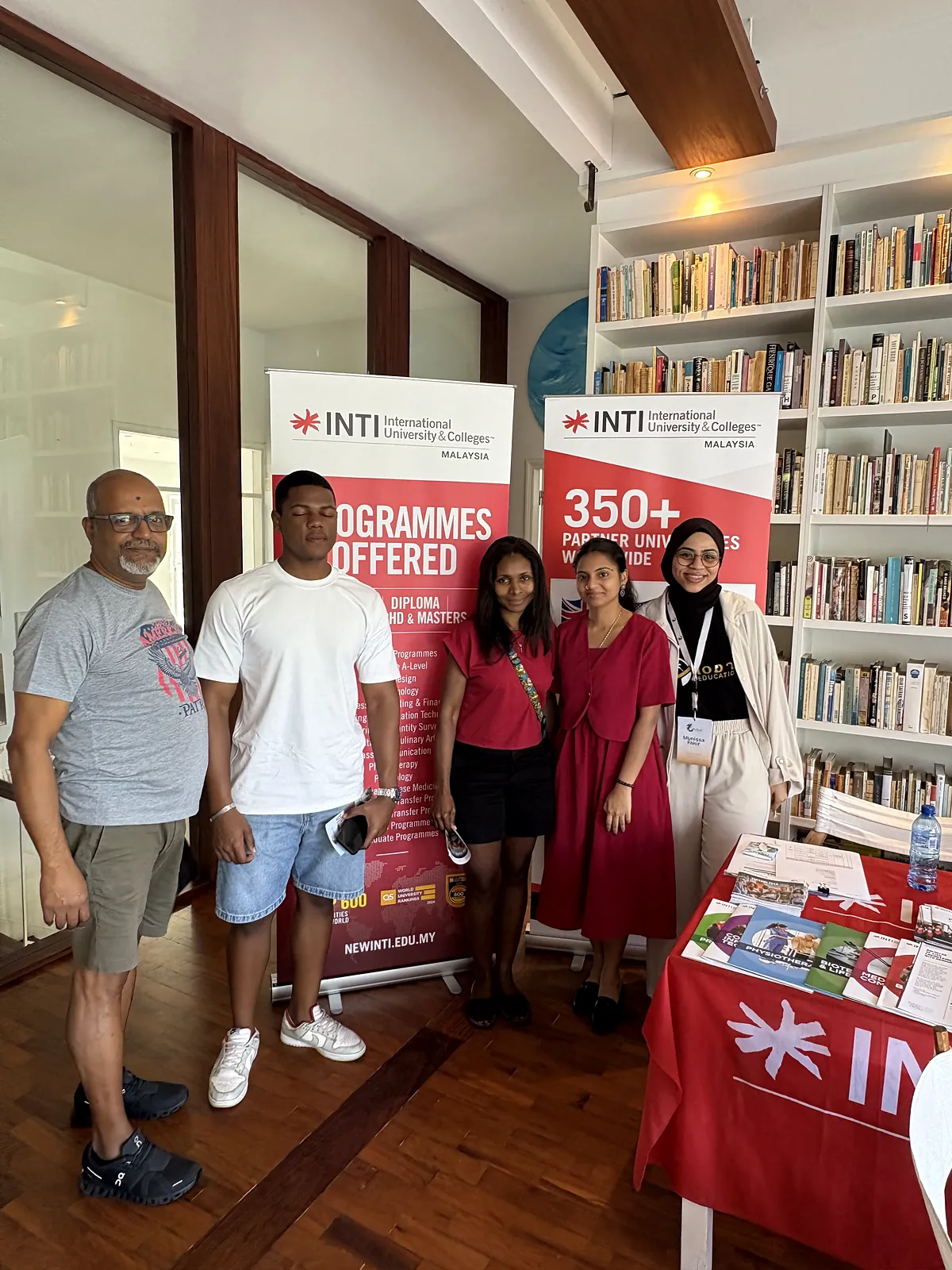 A family with the team at the open day